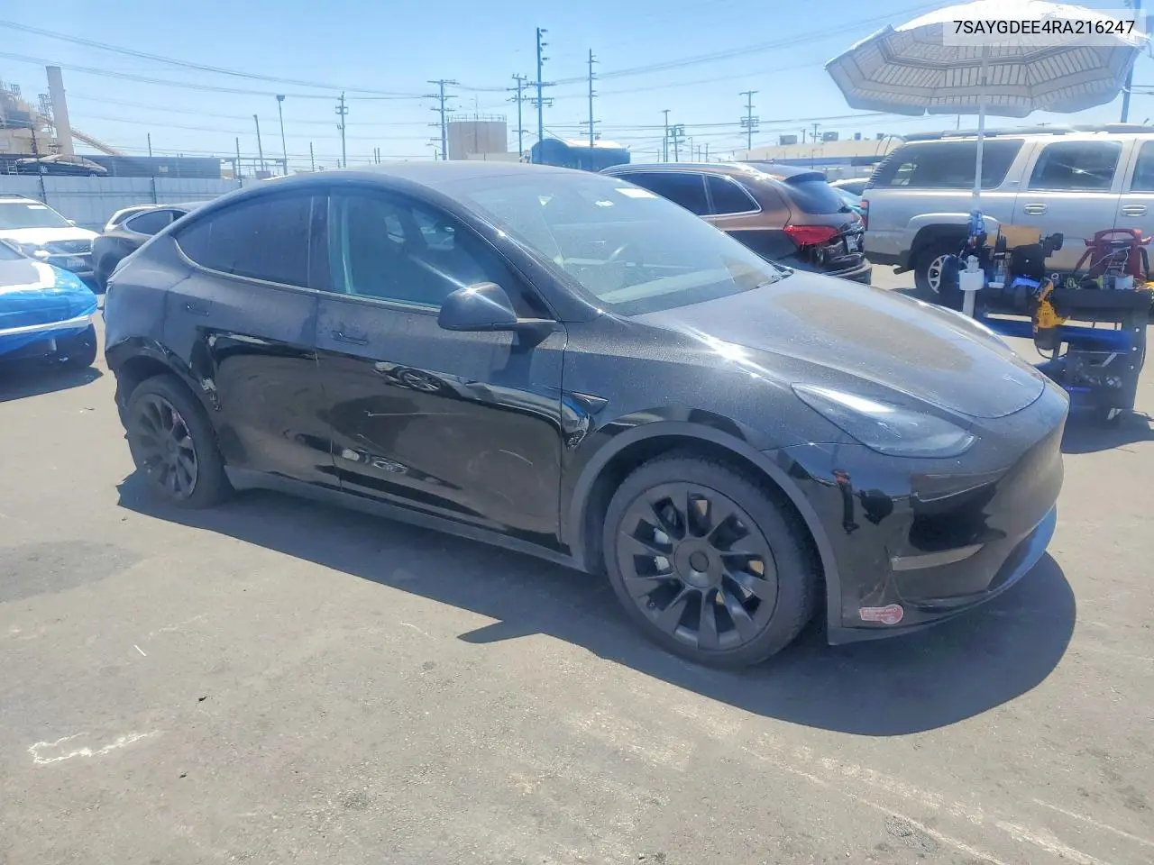 2024 Tesla Model Y VIN: 7SAYGDEE4RA216247 Lot: 59323096