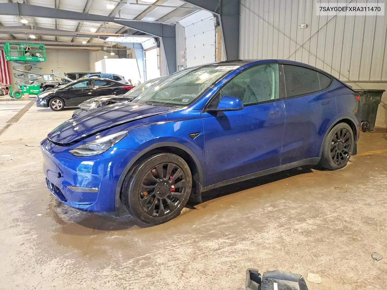 2024 Tesla Model Y VIN: 7SAYGDEFXRA311470 Lot: 59718406