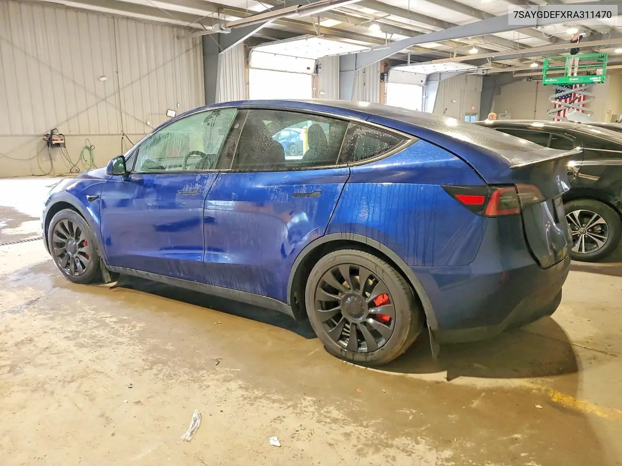 2024 Tesla Model Y VIN: 7SAYGDEFXRA311470 Lot: 59718406