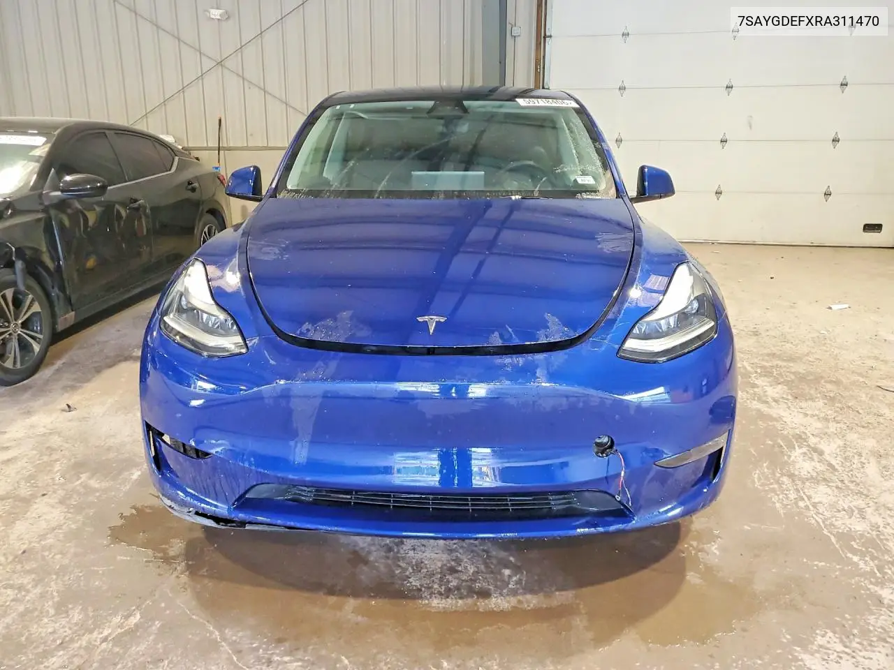 2024 Tesla Model Y VIN: 7SAYGDEFXRA311470 Lot: 59718406