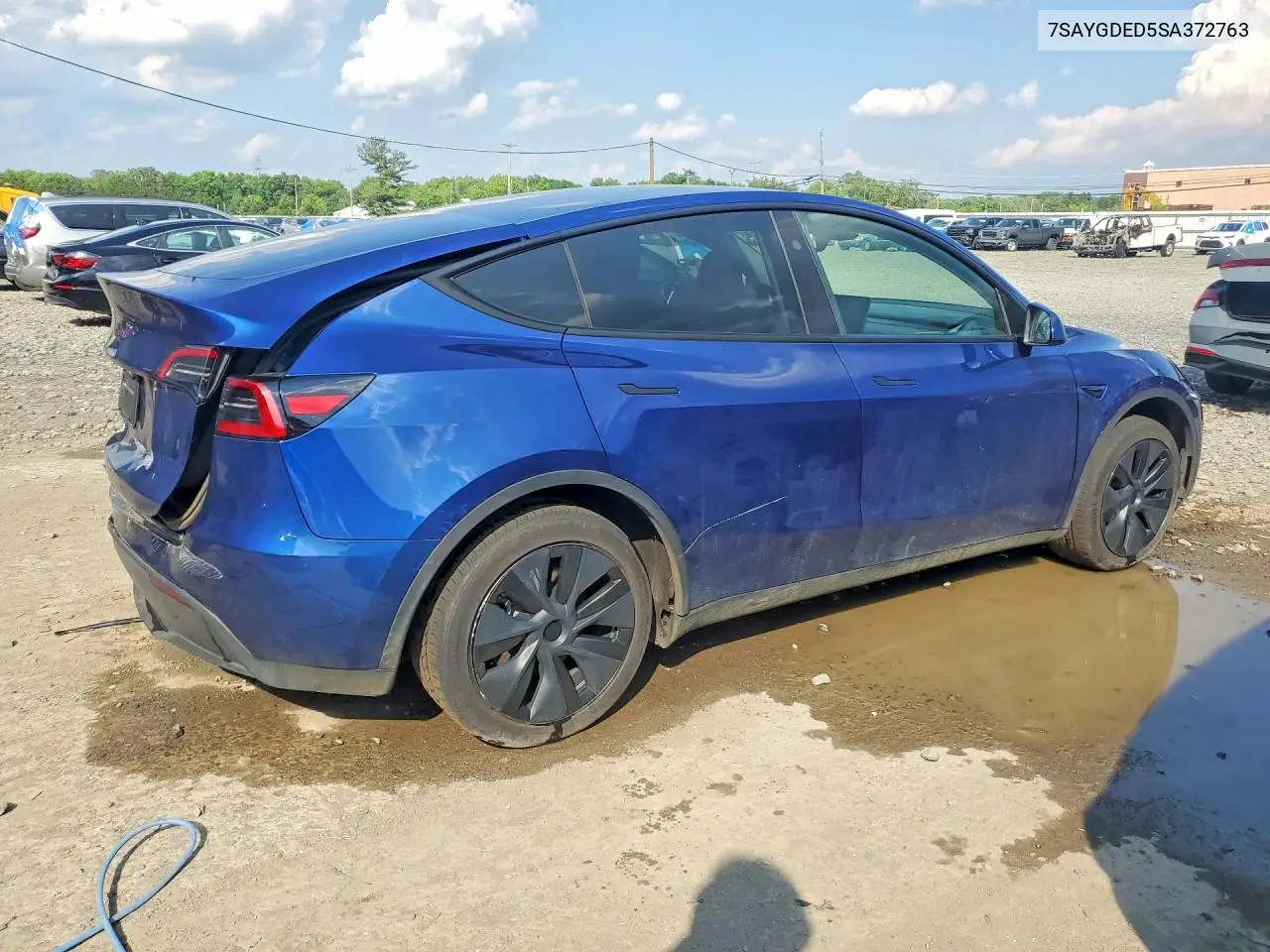 2025 Tesla Model Y VIN: 7SAYGDED5SA372763 Lot: 57120146