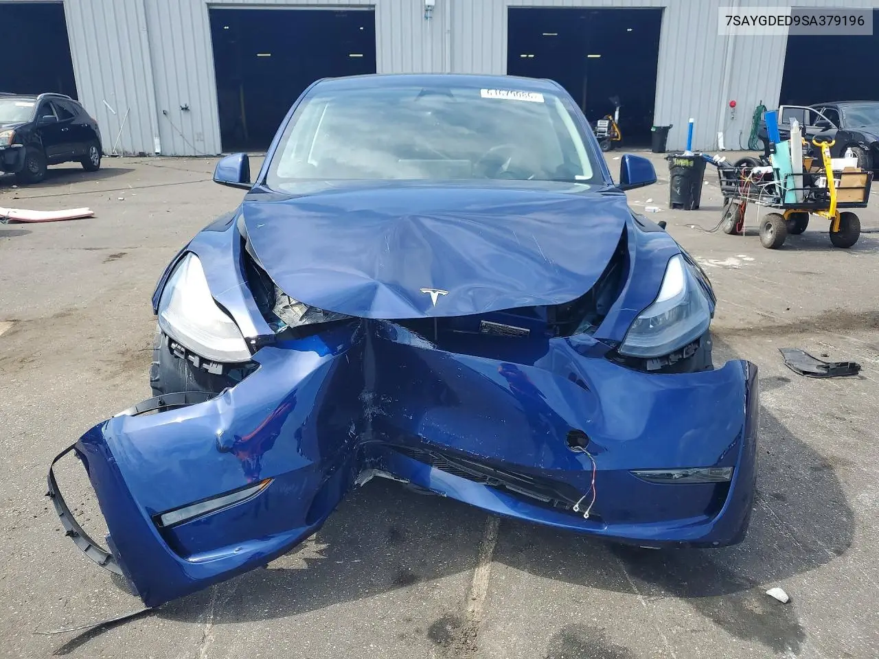 2025 Tesla Model Y VIN: 7SAYGDED9SA379196 Lot: 61679086