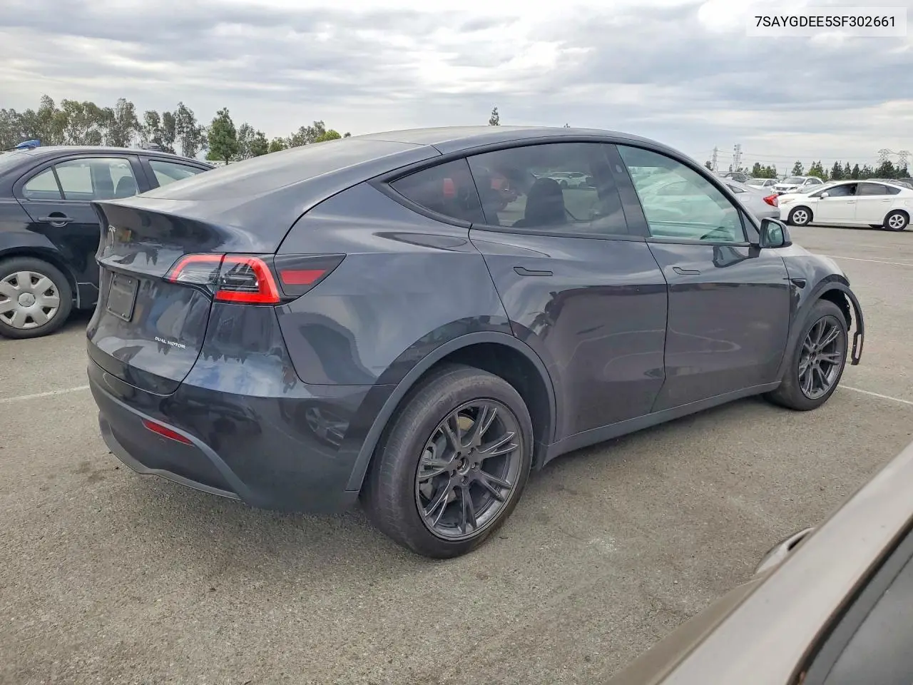 2025 Tesla Model Y VIN: 7SAYGDEE5SF302661 Lot: 61700496