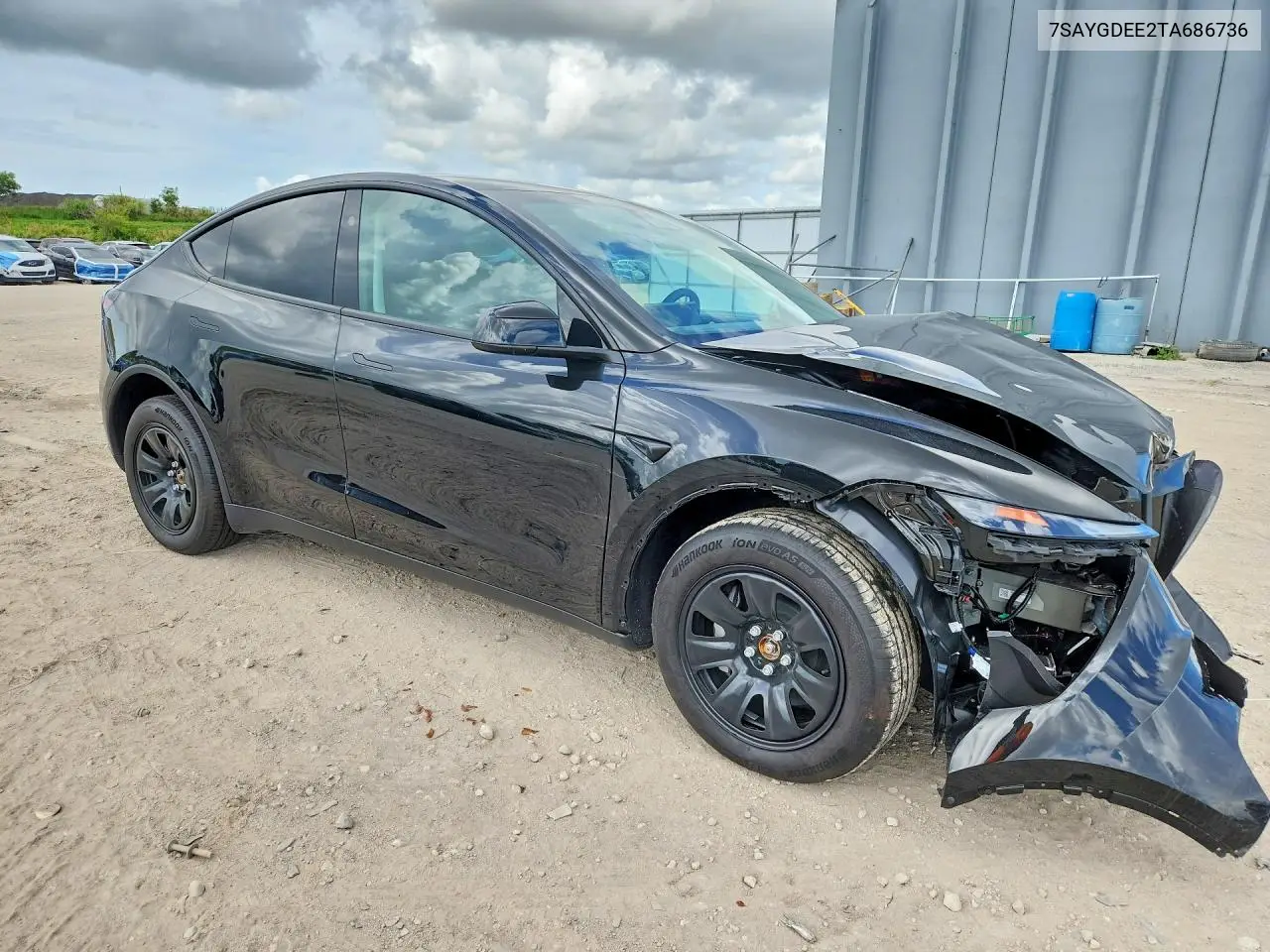 2026 Tesla Model Y VIN: 7SAYGDEE2TA686736 Lot: 59657266