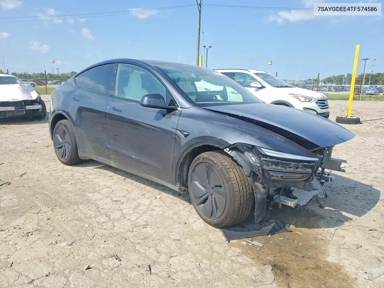 2026 Tesla Model Y VIN: 7SAYGDEE4TF574586 Lot: 60815326