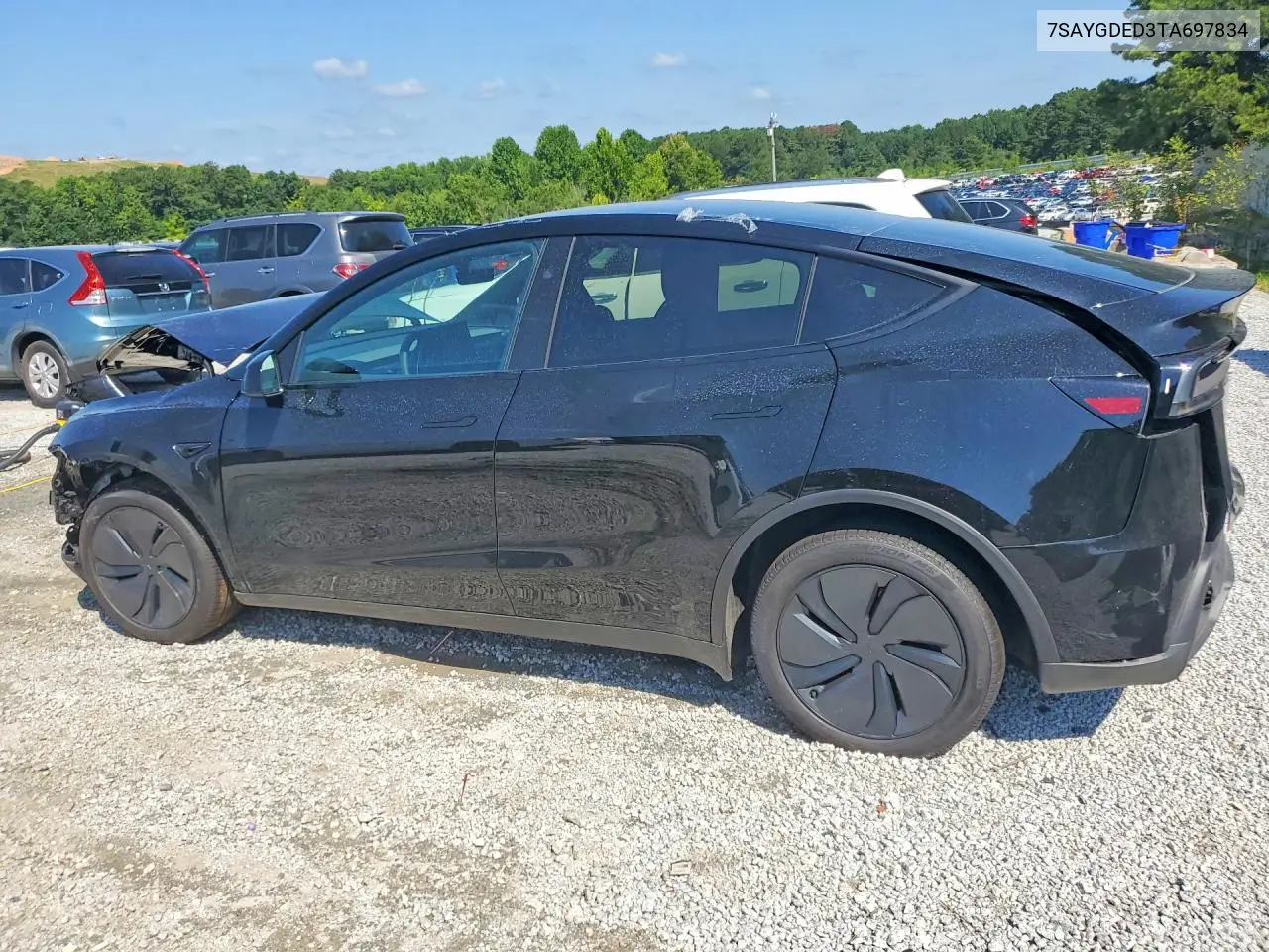 2026 Tesla Model Y VIN: 7SAYGDED3TA697834 Lot: 61371236