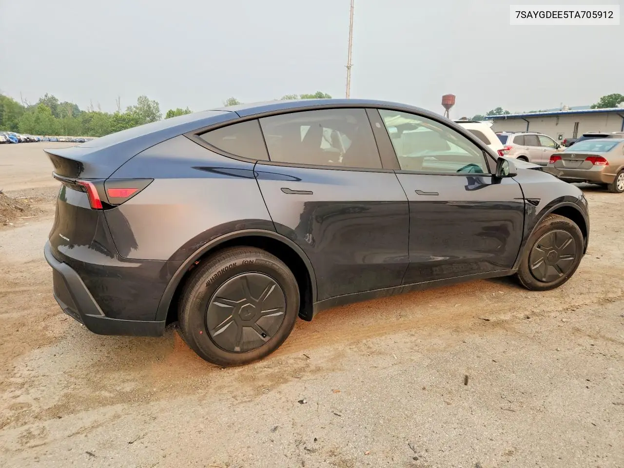 2026 Tesla Model Y VIN: 7SAYGDEE5TA705912 Lot: 61666886