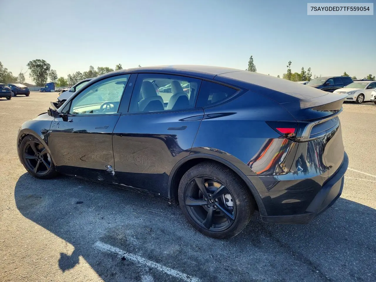 2026 Tesla Model Y VIN: 7SAYGDED7TF559054 Lot: 61916176