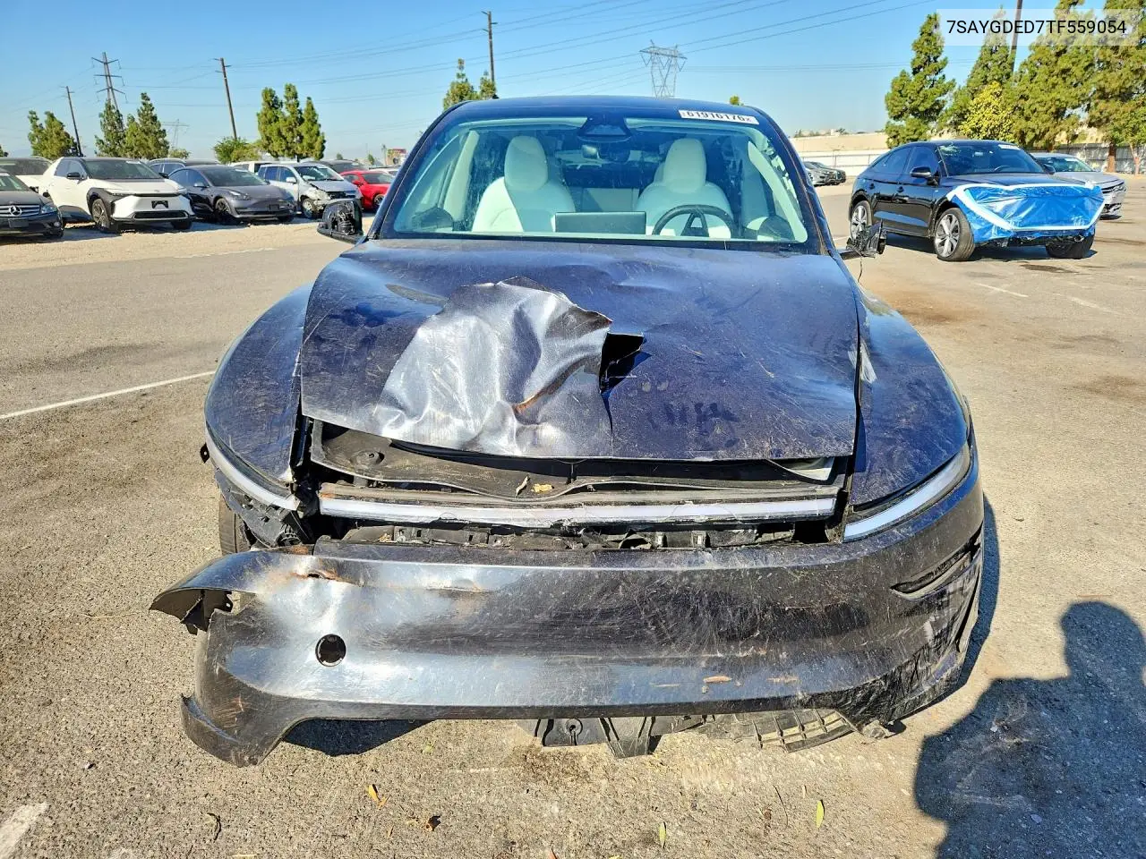 2026 Tesla Model Y VIN: 7SAYGDED7TF559054 Lot: 61916176