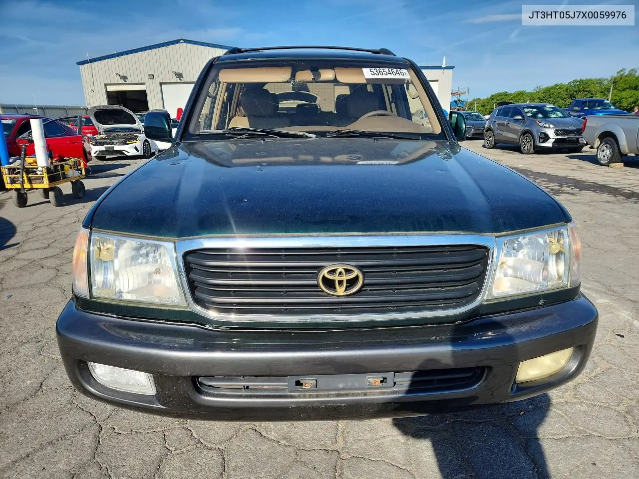 1999 Toyota Land Cruiser Base VIN: JT3HT05J7X0059976 Lot: 53654646