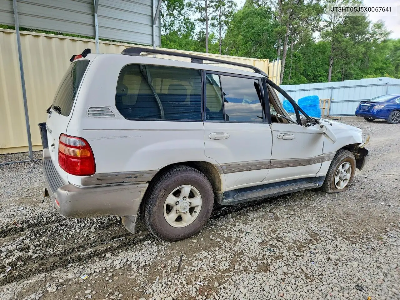 1999 Toyota Land Cruiser Base VIN: JT3HT05J5X0067641 Lot: 55851056