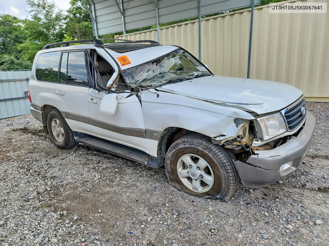 1999 Toyota Land Cruiser Base VIN: JT3HT05J5X0067641 Lot: 55851056