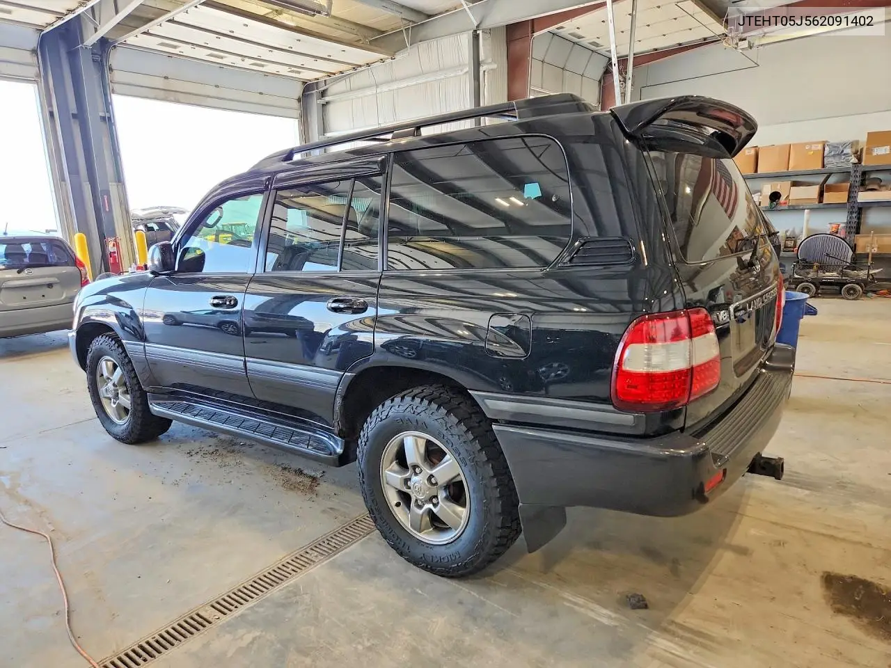 2006 Toyota Land Cruiser Base VIN: JTEHT05J562091402 Lot: 56730636