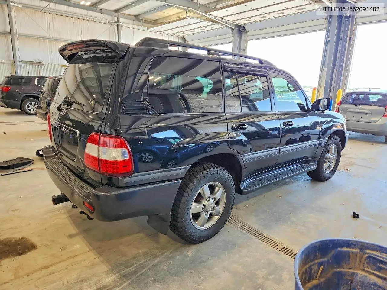 2006 Toyota Land Cruiser Base VIN: JTEHT05J562091402 Lot: 56730636