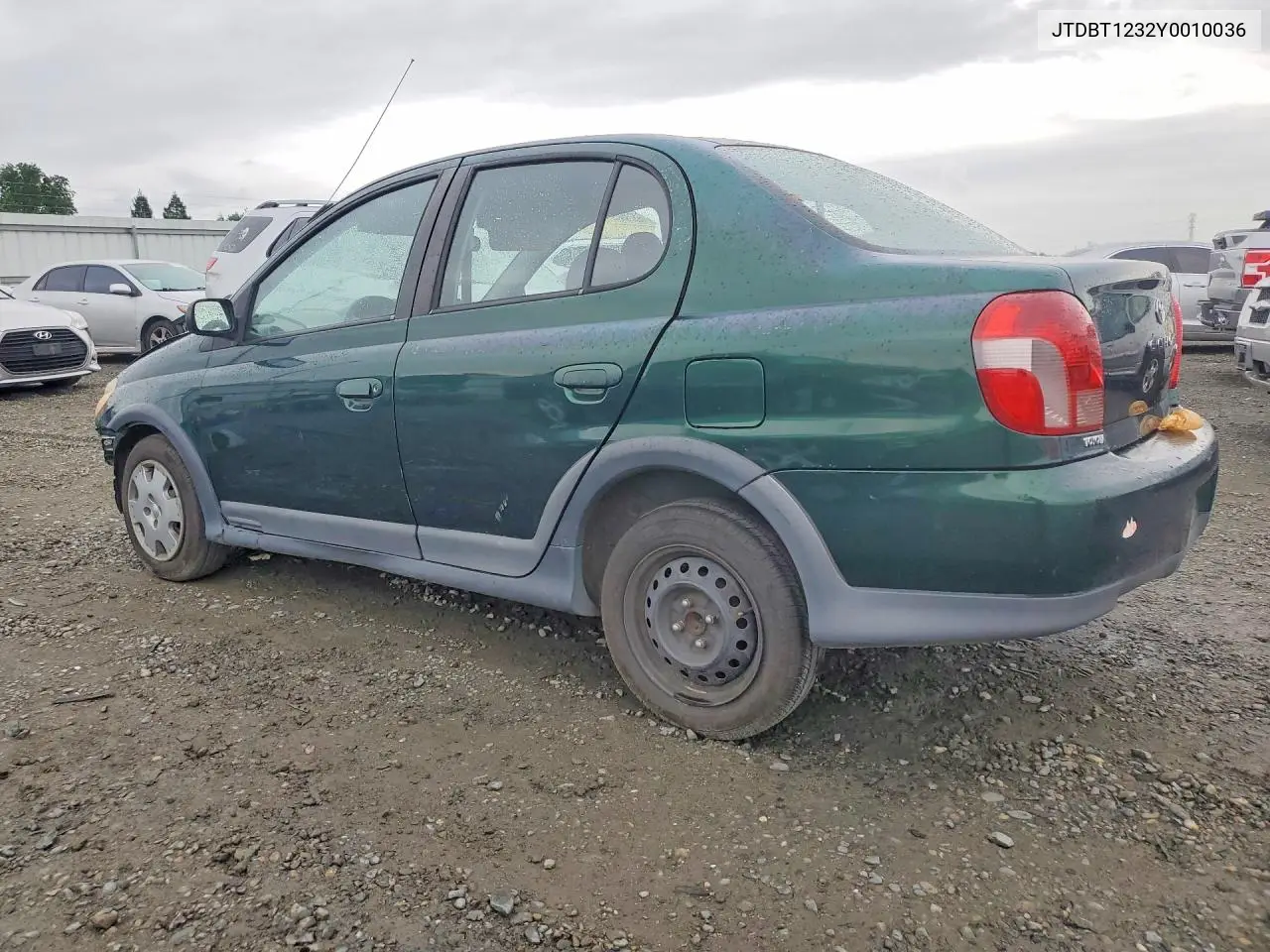 2000 Toyota Echo Base VIN: JTDBT1232Y0010036 Lot: 48119836