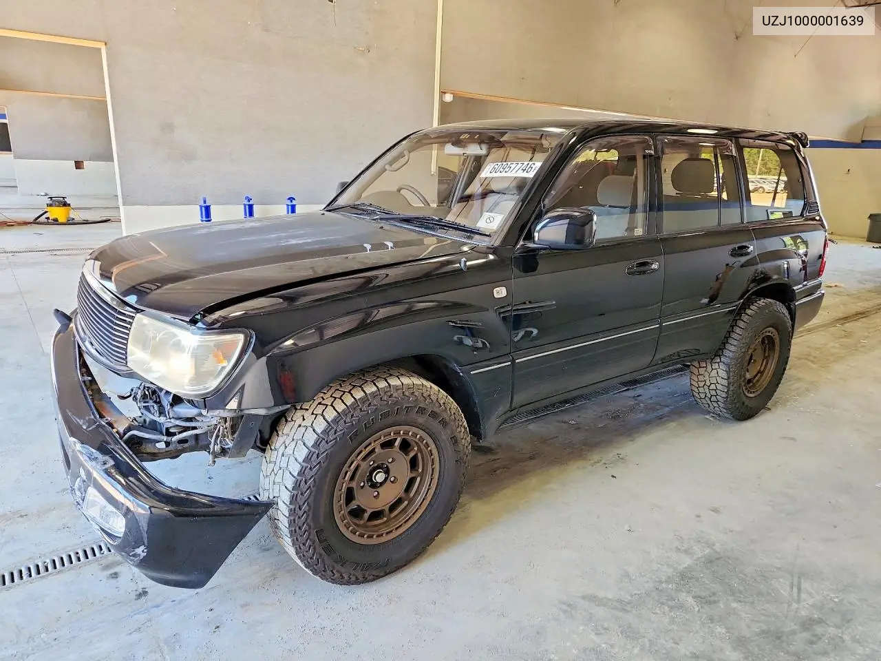 1998 Toyota Land Cruiser VIN: UZJ1000001639 Lot: 60957746