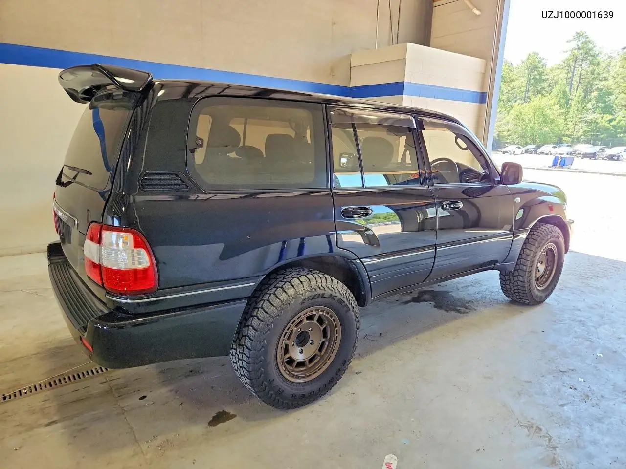 1998 Toyota Land Cruiser VIN: UZJ1000001639 Lot: 60957746