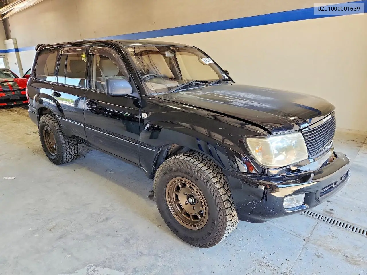 1998 Toyota Land Cruiser VIN: UZJ1000001639 Lot: 60957746