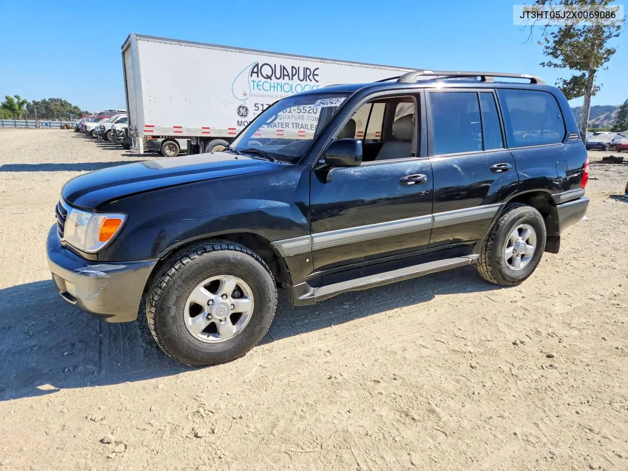 1999 Toyota Land Cruiser Base VIN: JT3HT05J2X0069086 Lot: 59403426