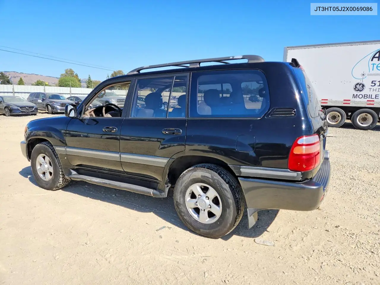 1999 Toyota Land Cruiser Base VIN: JT3HT05J2X0069086 Lot: 59403426