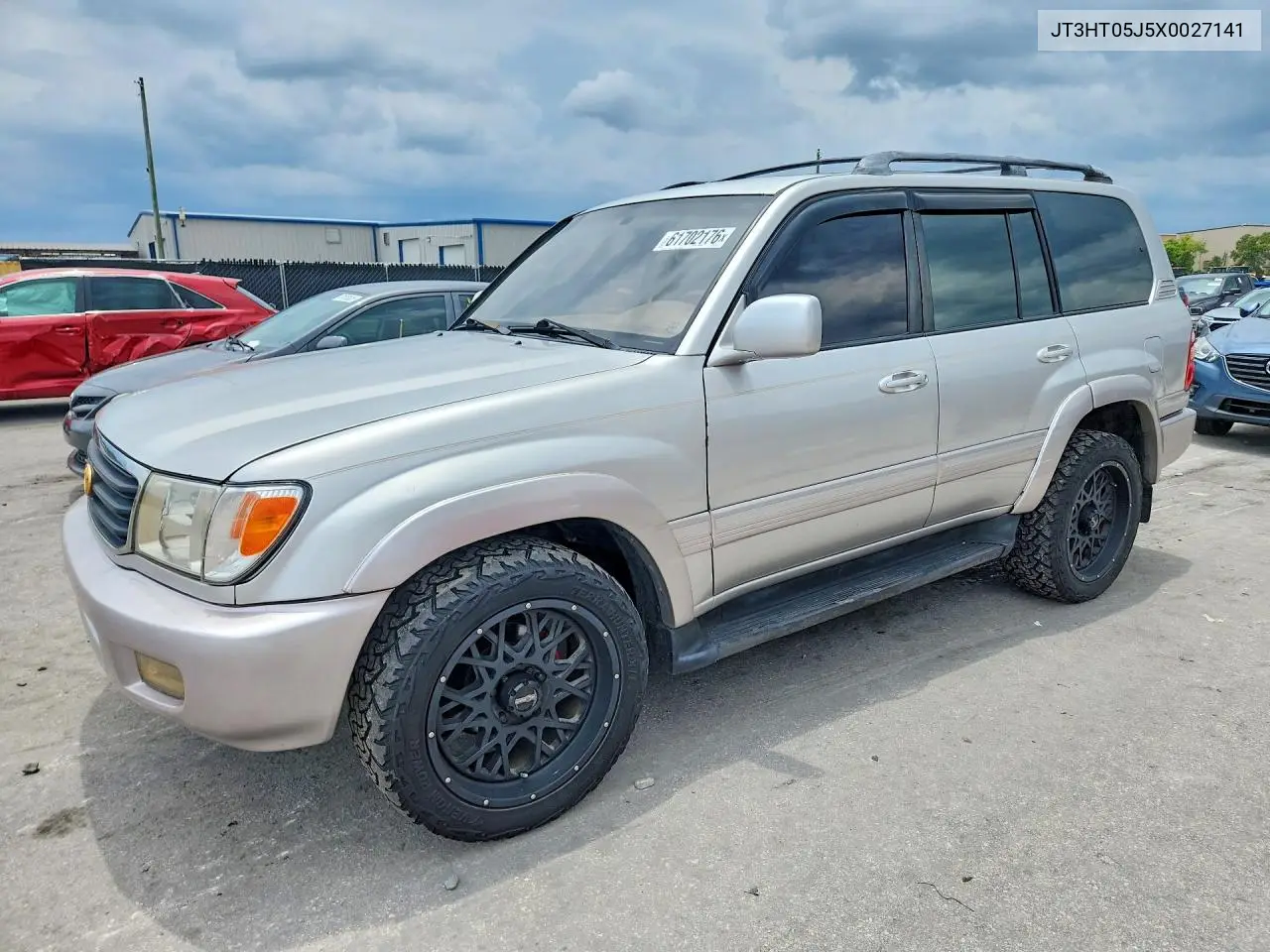 1999 Toyota Land Cruiser Base VIN: JT3HT05J5X0027141 Lot: 61702176