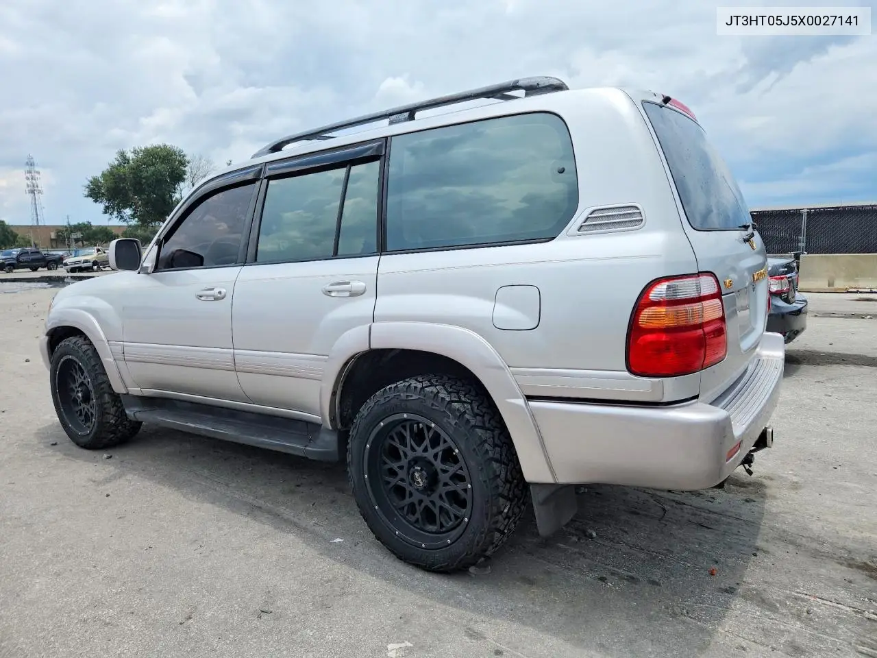1999 Toyota Land Cruiser Base VIN: JT3HT05J5X0027141 Lot: 61702176
