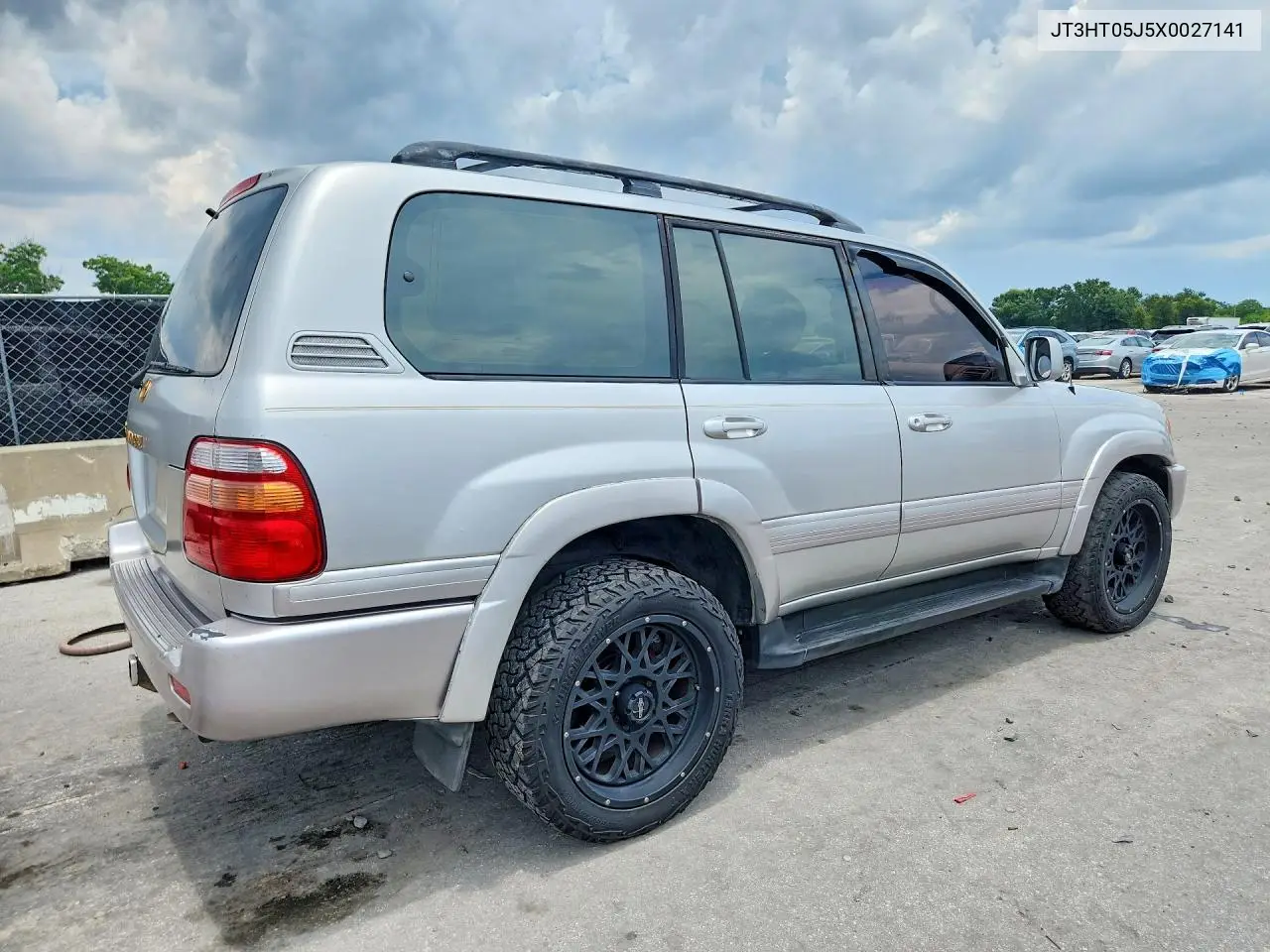 1999 Toyota Land Cruiser Base VIN: JT3HT05J5X0027141 Lot: 61702176