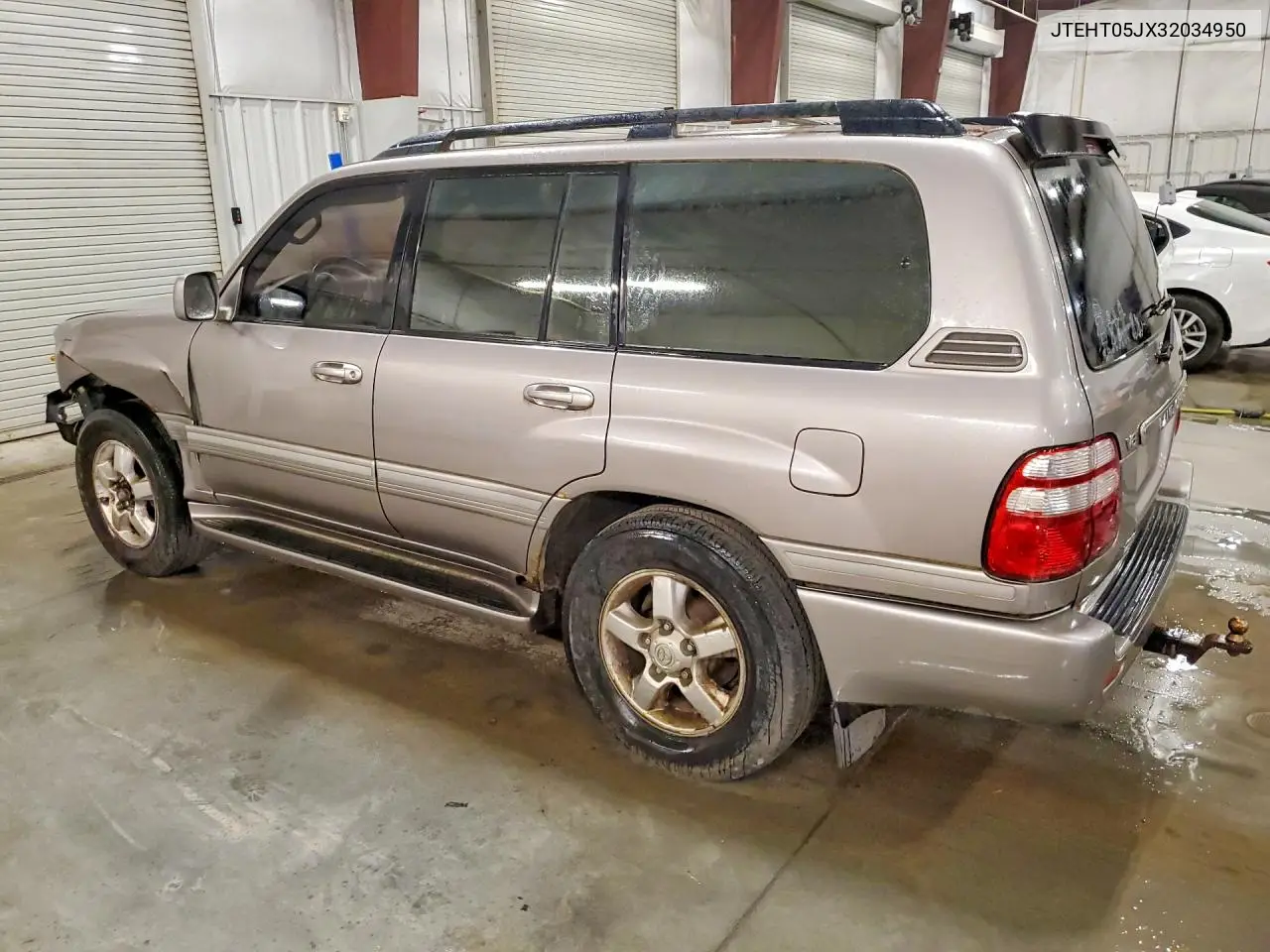 2003 Toyota Land Cruiser Base VIN: JTEHT05JX32034950 Lot: 61874006