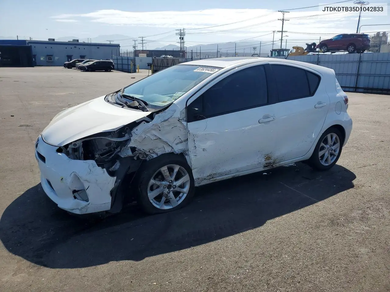 2013 Toyota Prius C Four VIN: JTDKDTB35D1042833 Lot: 61624456