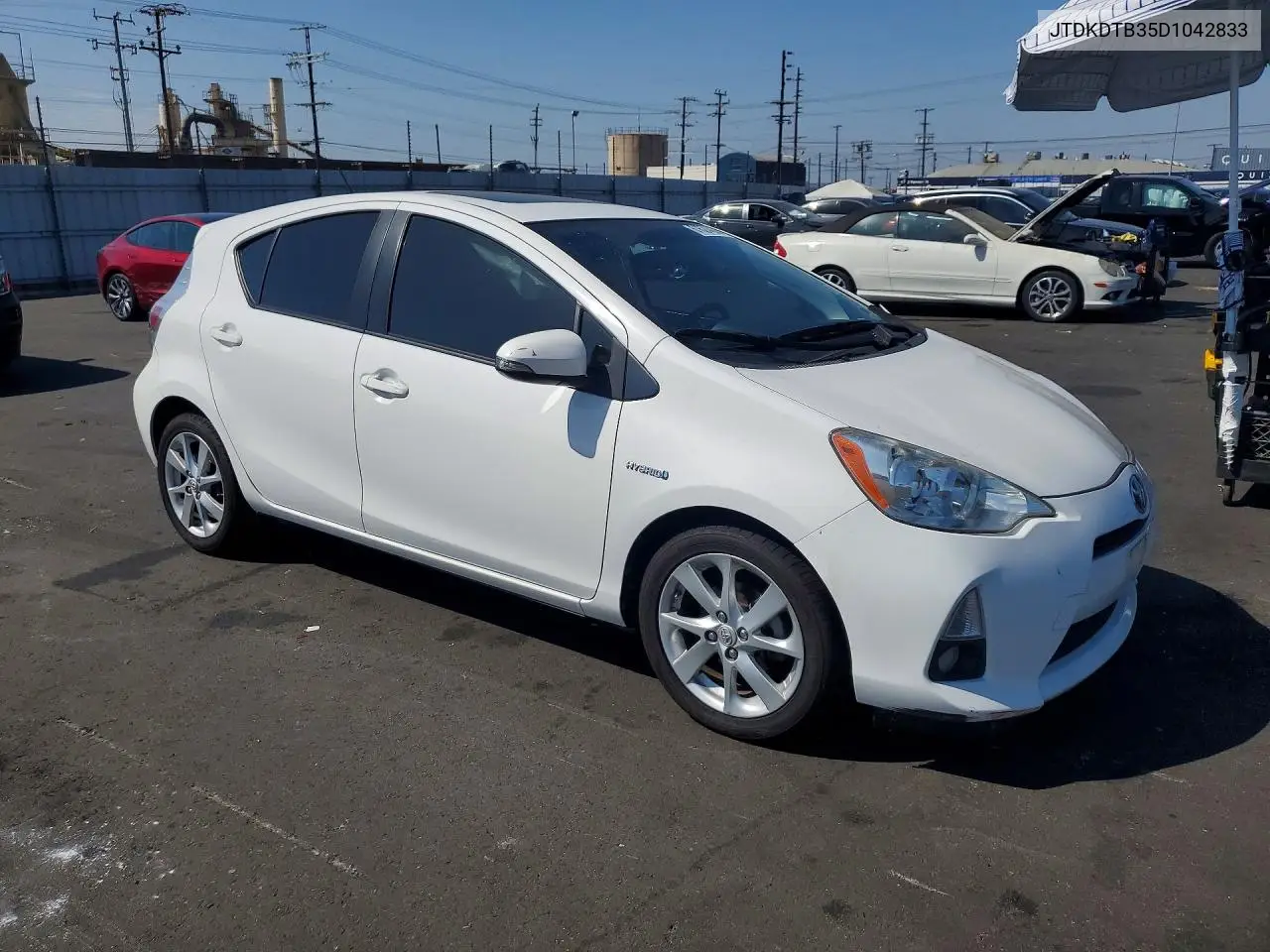 2013 Toyota Prius C Four VIN: JTDKDTB35D1042833 Lot: 61624456