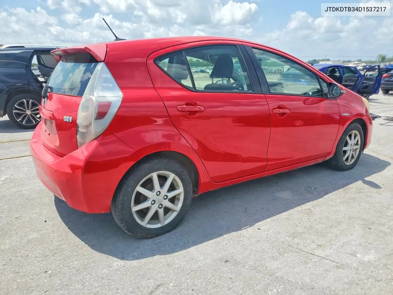 2013 Toyota Prius C Three VIN: JTDKDTB34D1537217 Lot: 61755956