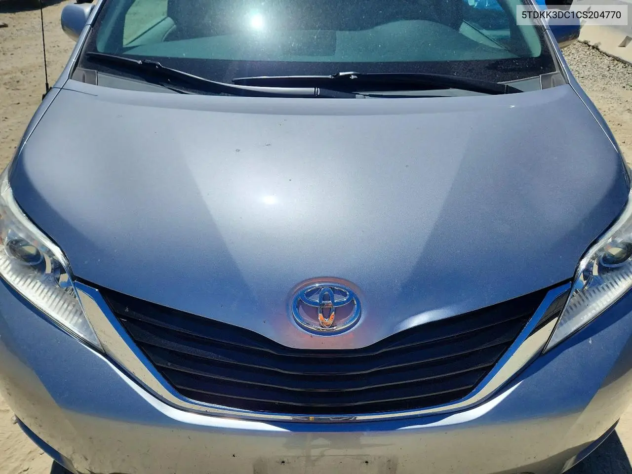 2012 Toyota Sienna Le VIN: 5TDKK3DC1CS204770 Lot: 61625436