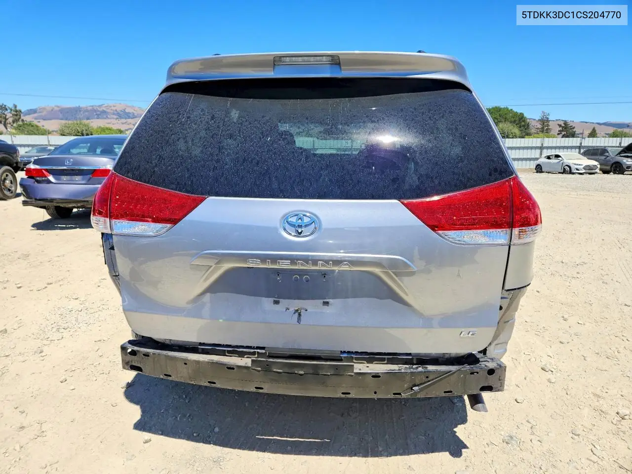 2012 Toyota Sienna Le VIN: 5TDKK3DC1CS204770 Lot: 61625436