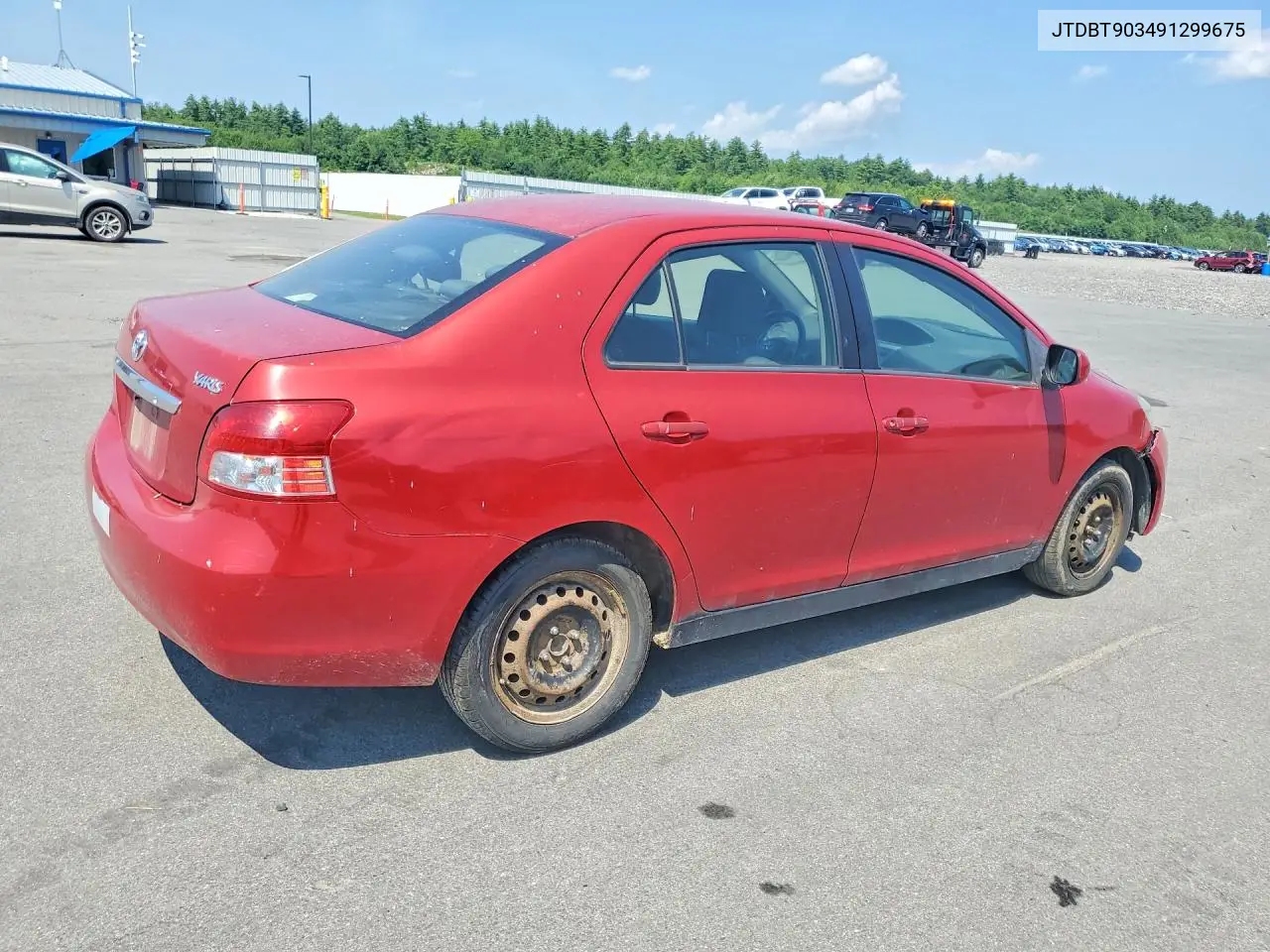 2009 Toyota Yaris Base VIN: JTDBT903491299675 Lot: 60189366
