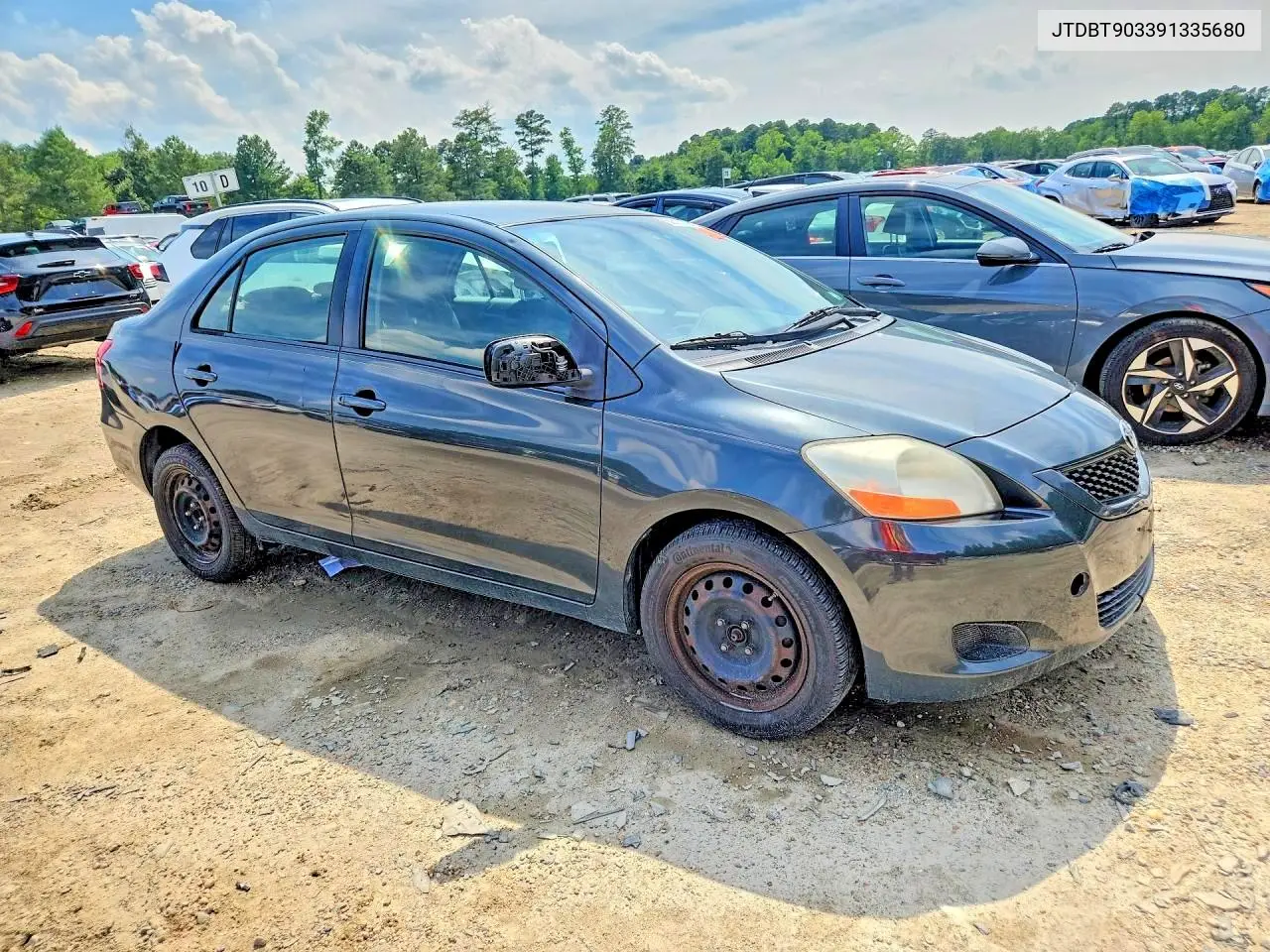 2009 Toyota Yaris Base VIN: JTDBT903391335680 Lot: 60581106