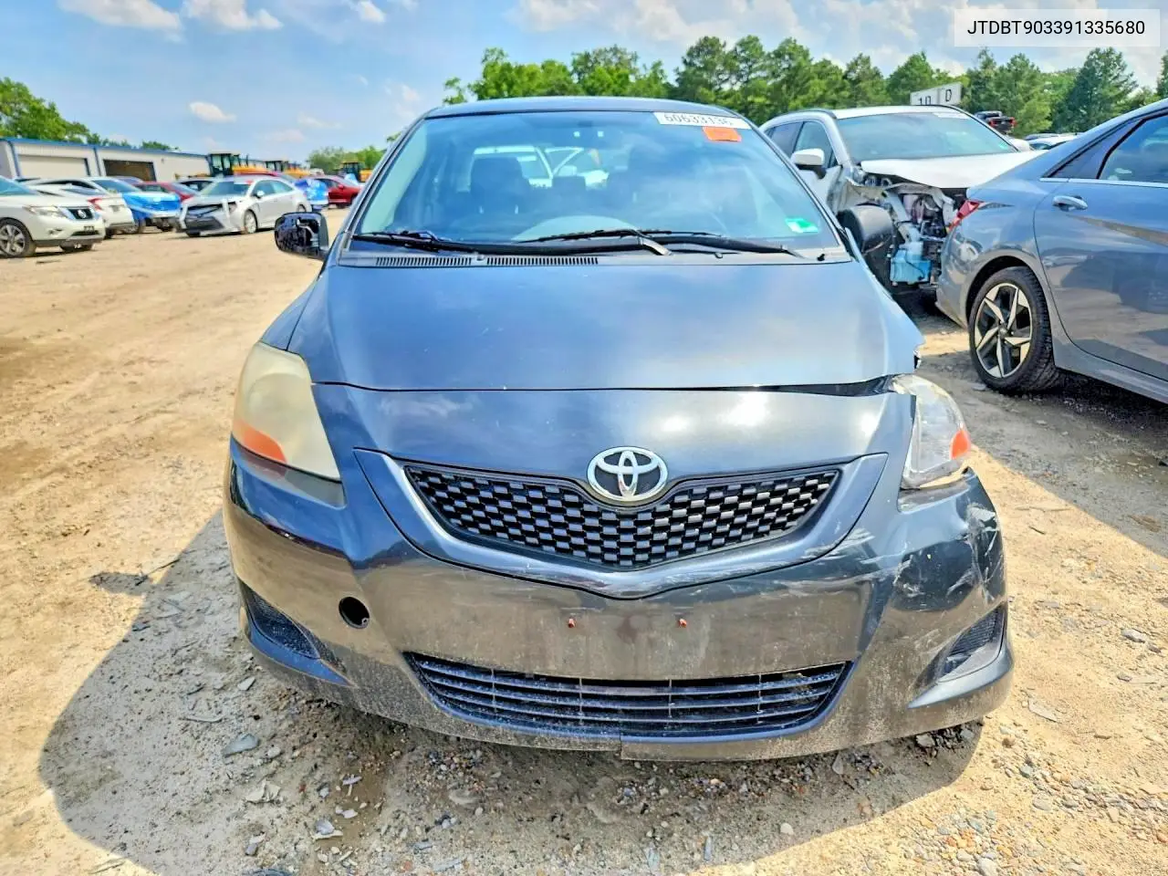 2009 Toyota Yaris Base VIN: JTDBT903391335680 Lot: 60581106