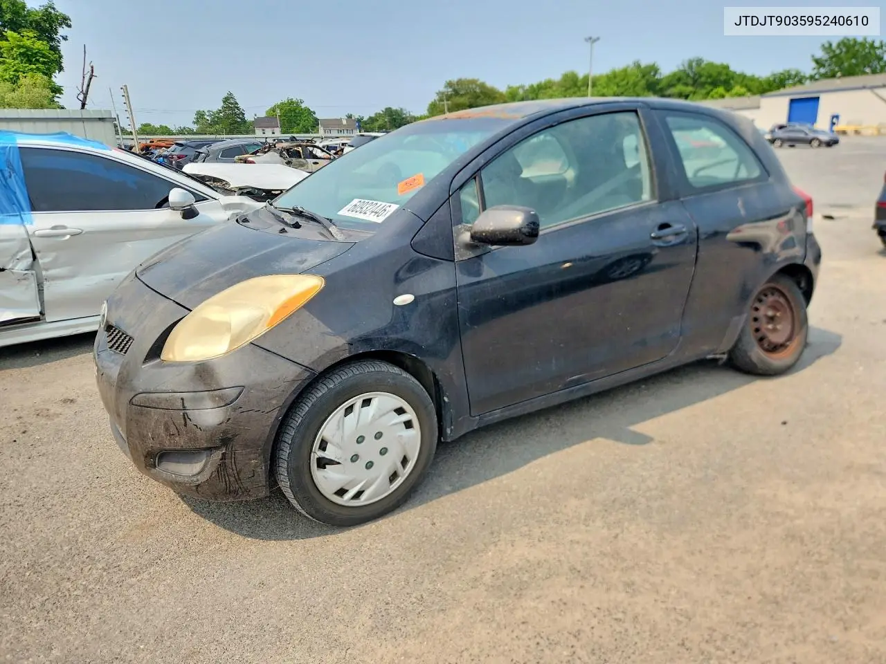 2009 Toyota Yaris Base VIN: JTDJT903595240610 Lot: 60932446