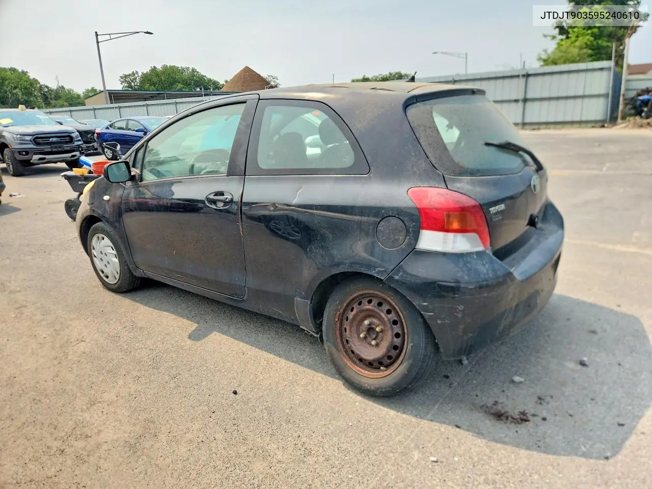 2009 Toyota Yaris Base VIN: JTDJT903595240610 Lot: 60932446