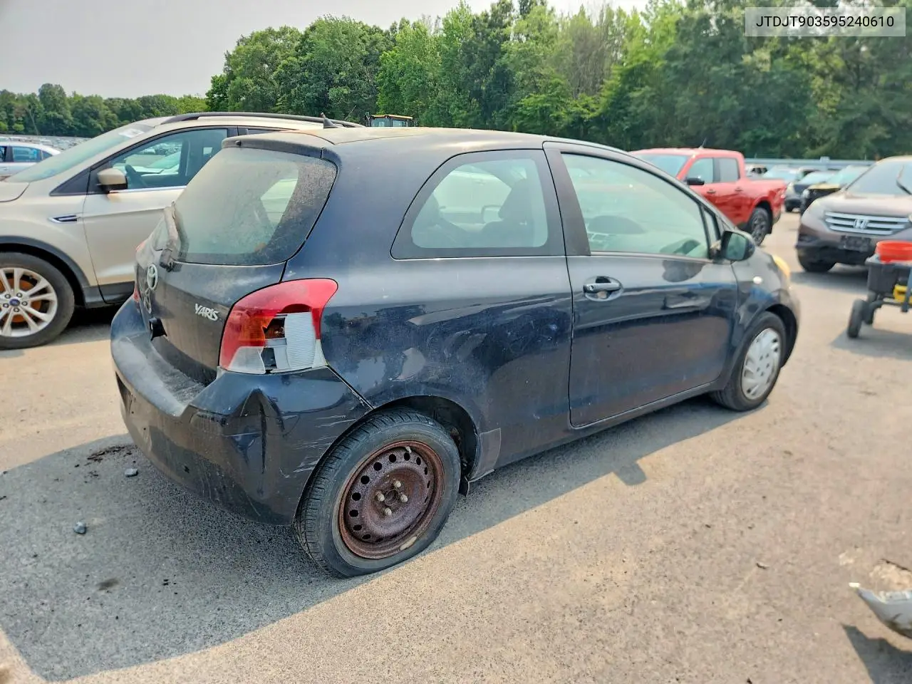 2009 Toyota Yaris Base VIN: JTDJT903595240610 Lot: 60932446