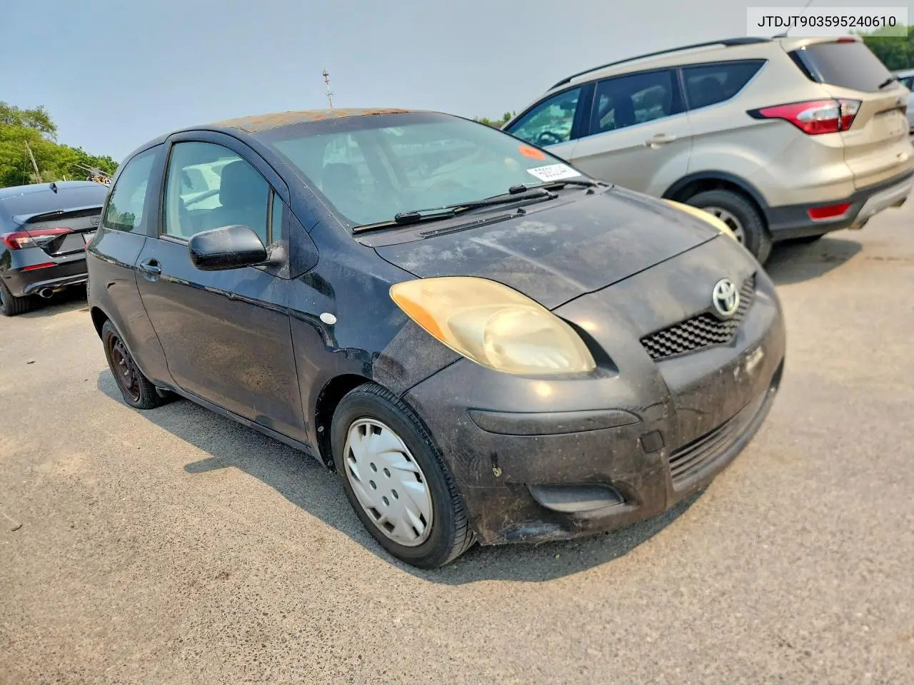 2009 Toyota Yaris Base VIN: JTDJT903595240610 Lot: 60932446