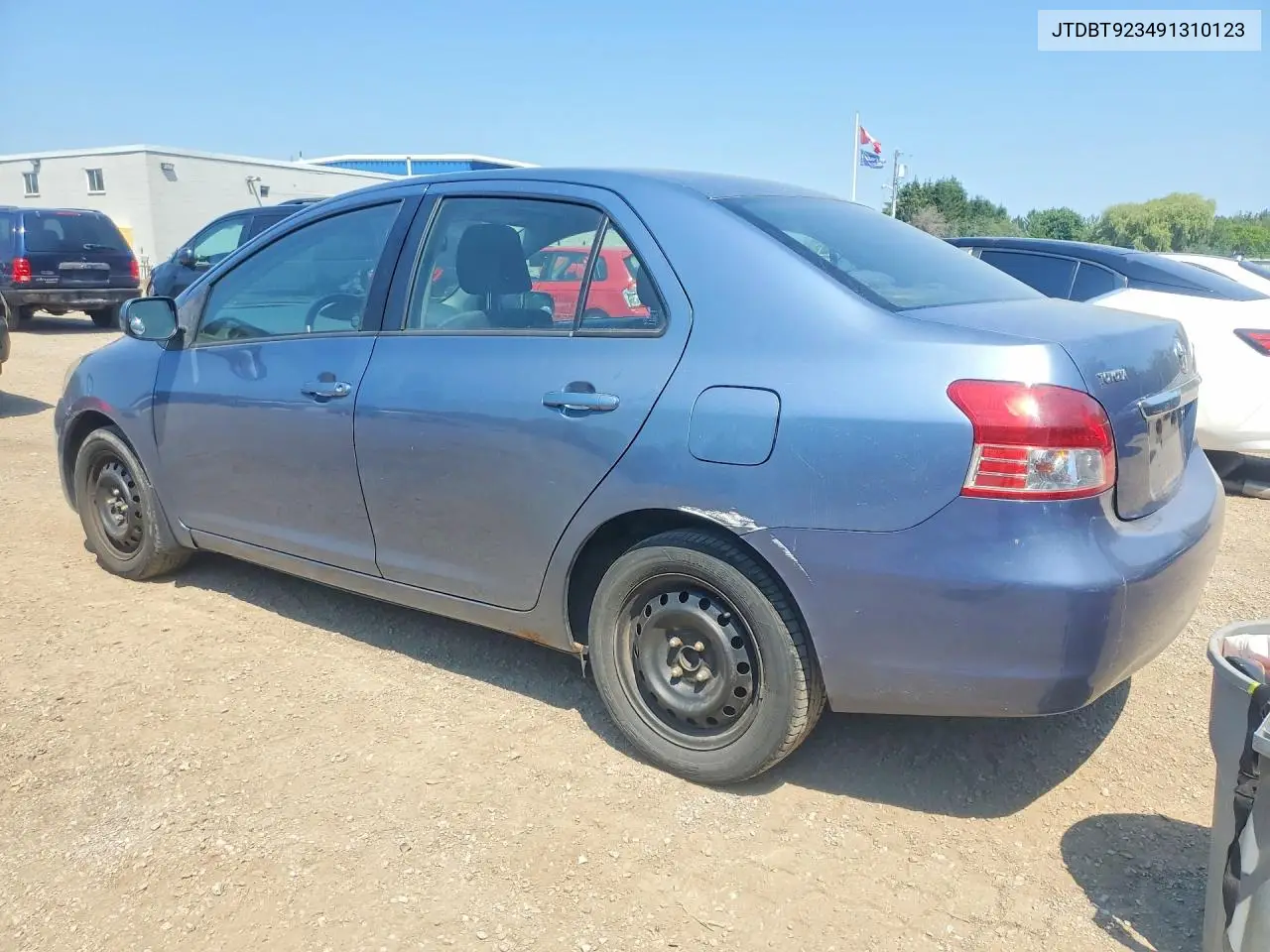 2009 Toyota Yaris Base VIN: JTDBT923491310123 Lot: 60983226
