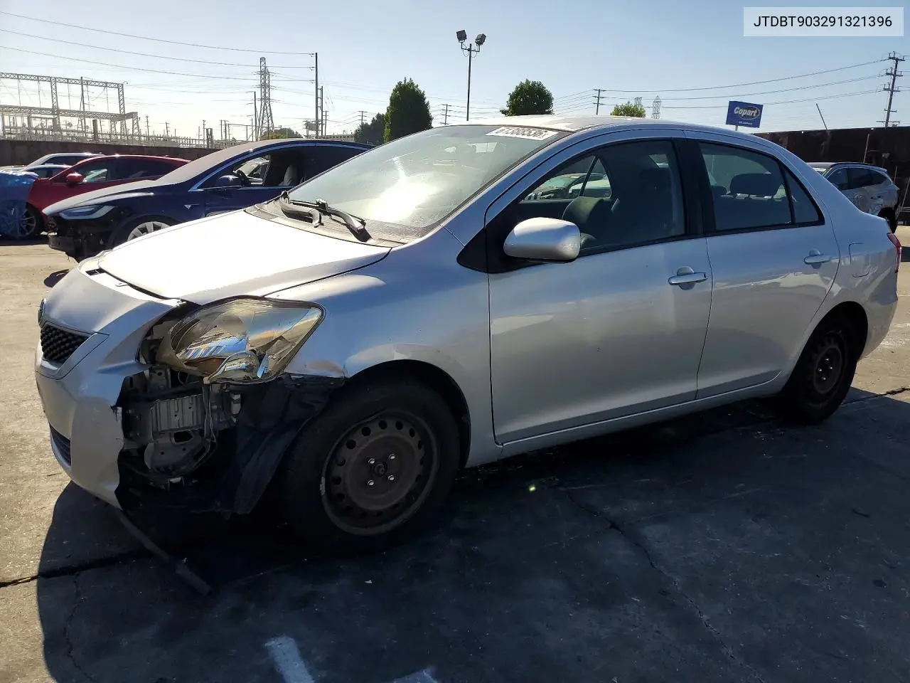 2009 Toyota Yaris Base VIN: JTDBT903291321396 Lot: 61388536