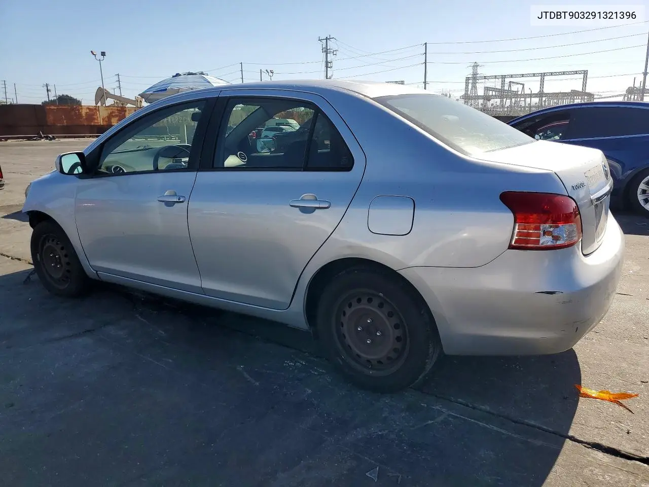 2009 Toyota Yaris Base VIN: JTDBT903291321396 Lot: 61388536