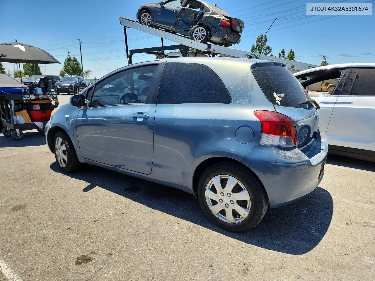 2010 Toyota Yaris Base VIN: JTDJT4K32A5301674 Lot: 60766146