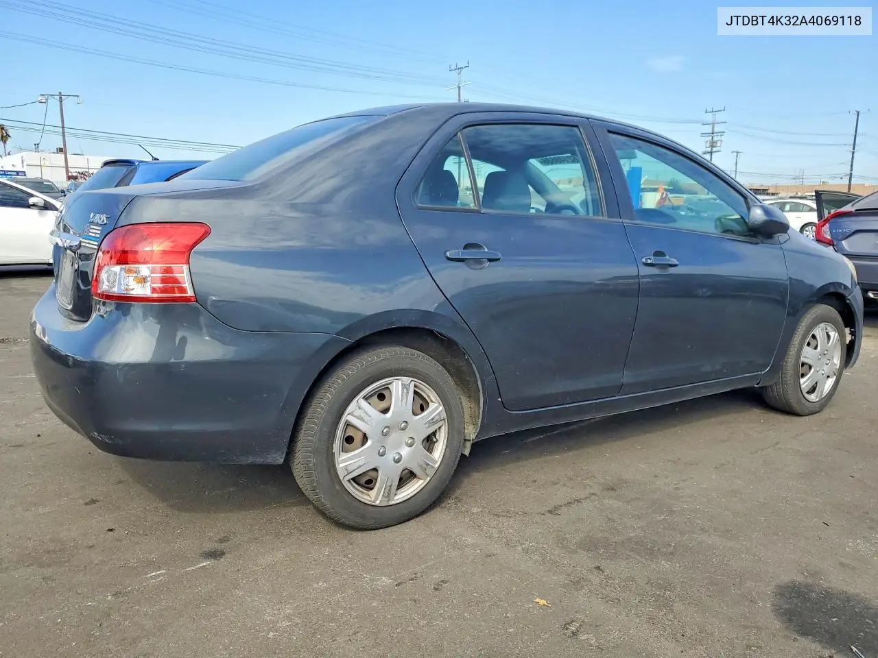 2010 Toyota Yaris Base VIN: JTDBT4K32A4069118 Lot: 62148686