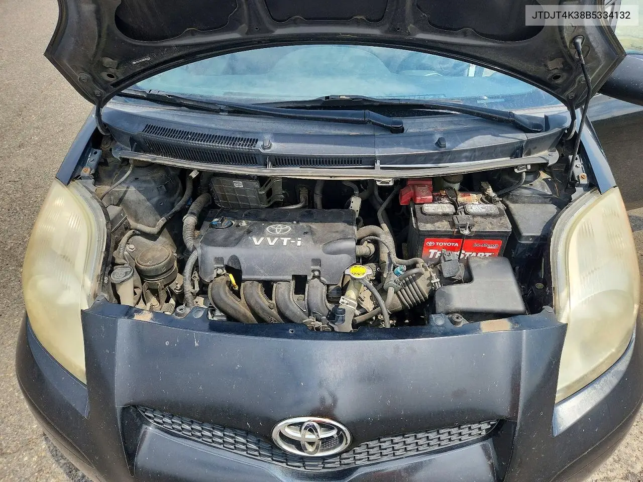 2011 Toyota Yaris Base VIN: JTDJT4K38B5334132 Lot: 62008206