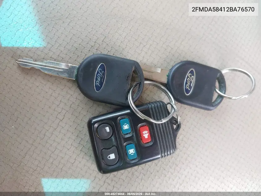2002 Ford Windstar Limited VIN: 2FMDA58412BA76570 Lot: 45274044