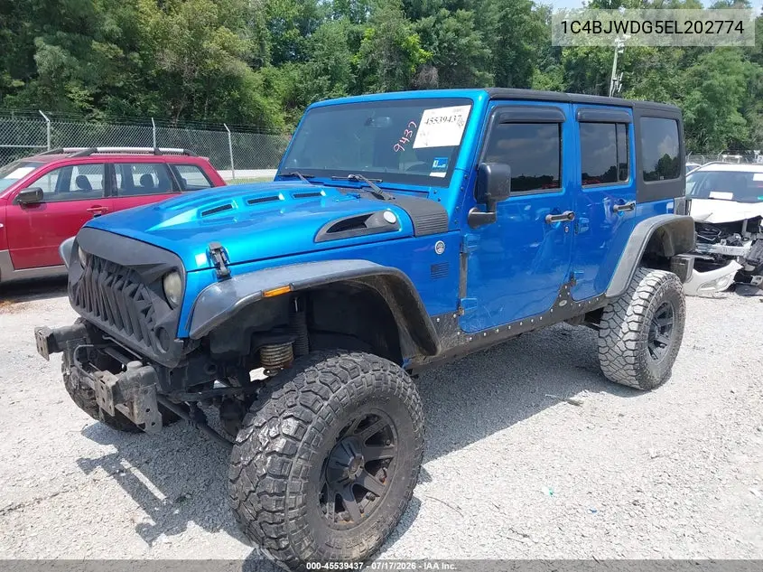 2014 Jeep Wrangler Unlimited Freedom Edition VIN: 1C4BJWDG5EL202774 Lot: 45539437