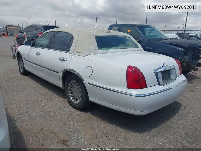 1998 Lincoln Town Car Cartier VIN: 1LNFM83W4WY692041 Lot: 45378999
