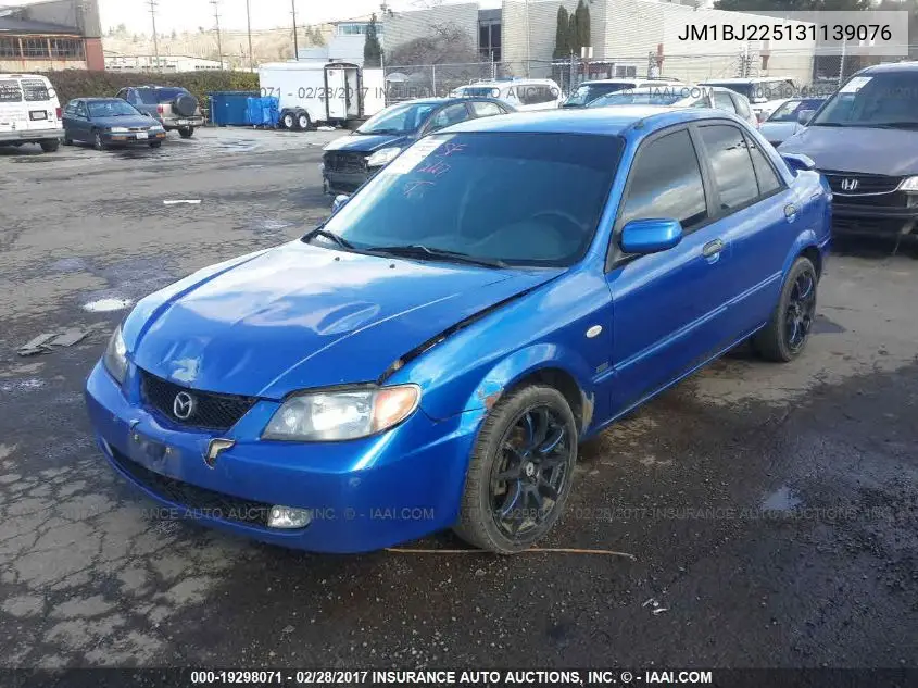 2003 Mazda Protege VIN: JM1BJ225131139076 Lot: 19298071